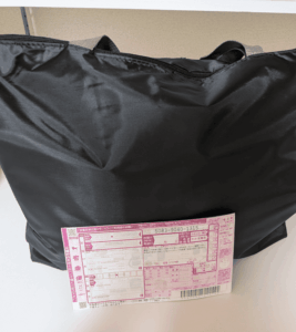 返却時のトートバッグと送り状